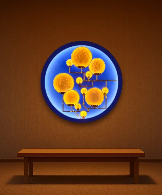 Mater Nostra luminous sculpture displayed on a wall with bench.