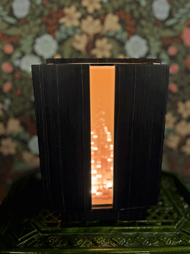 Turris Lucis light sculpture closed, light visible through vertical slit