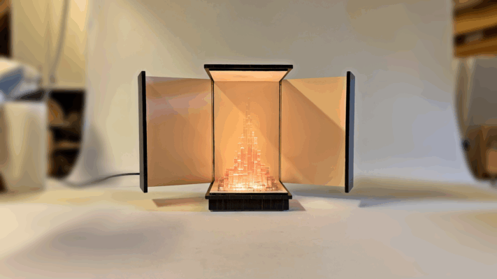 Turris Lucis light sculpture photographed in studio, front view with open doors