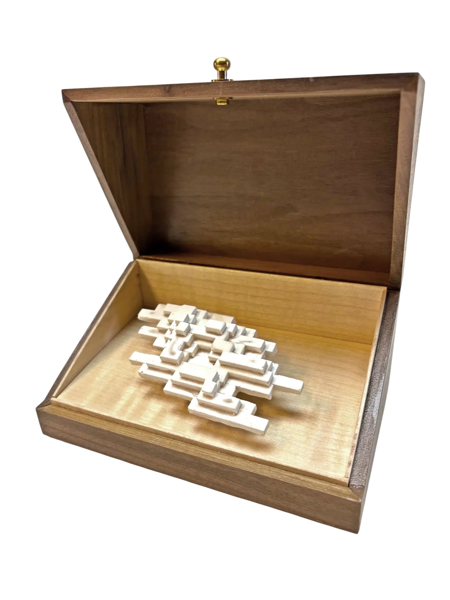 Open walnut box revealing the luminous white sculpture of Vapor Minimus, glowing like a fleeting vapor.